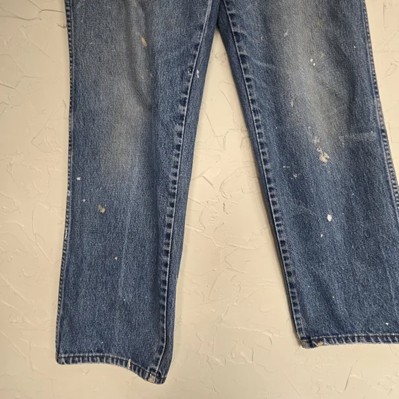 Vintage Levi's 557 Cowboy Distressed Jeans